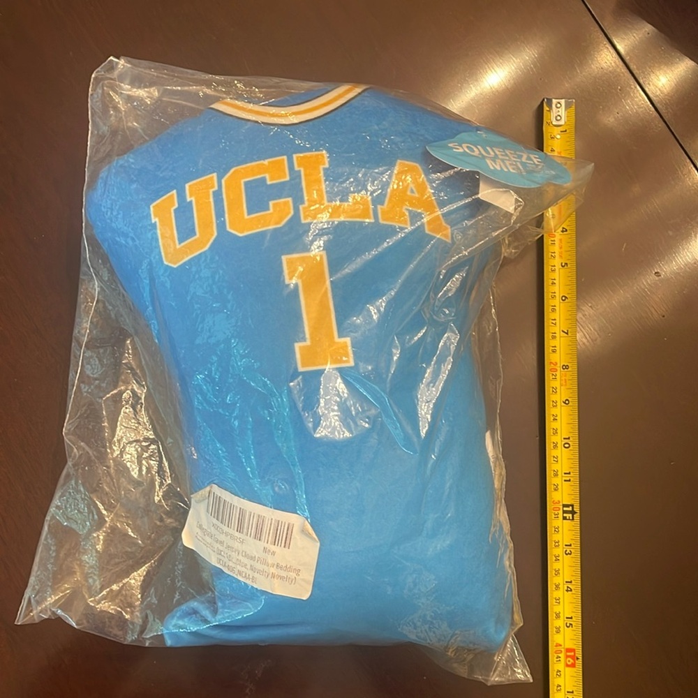 NWT UCLA collegiate, travel, jersey cloud pillow blue yellow